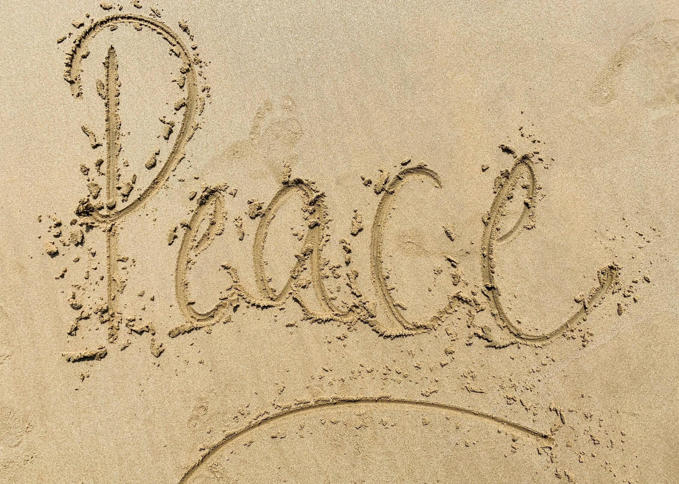 peace written in the sand